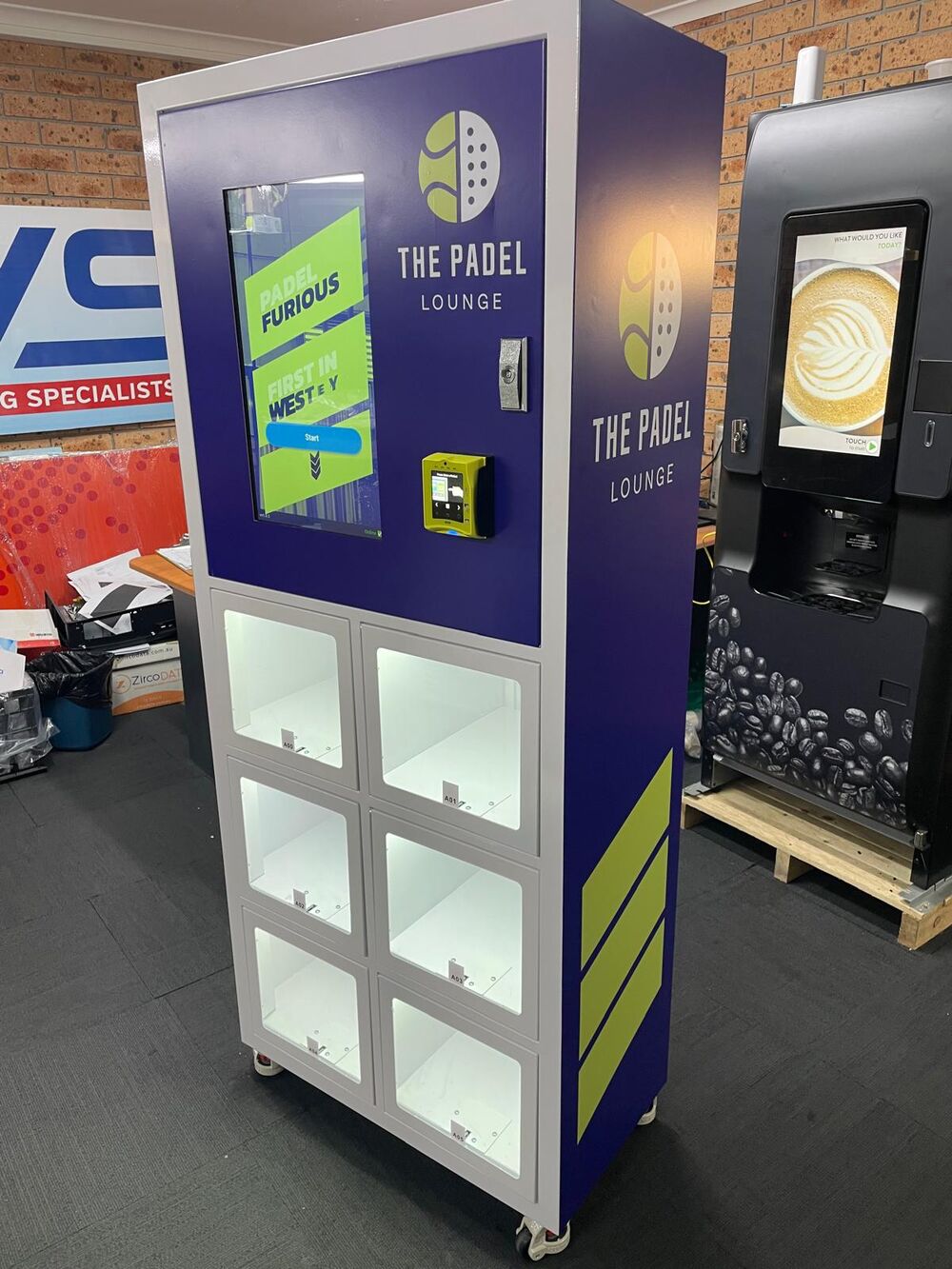 Six-compartment padel racket hire locker finished in a padel club's own branding, with touchscreen and contactless card reader