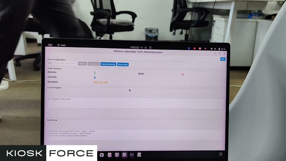 Laptop running the KioskForce Millimeter Wave Radar Traffic Monitoring System, showing entries, exits, current count and monitoring duration